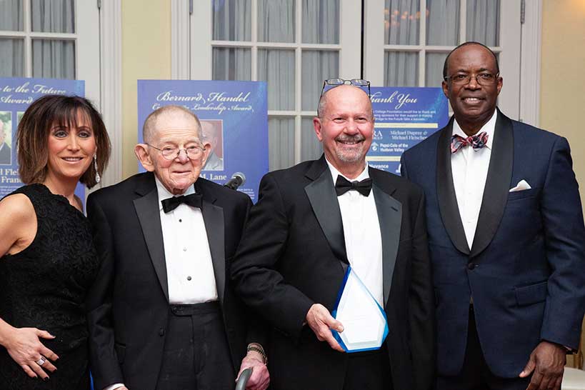 Left to right: DCC President Peter Grant Jordan, Ron Lane, Bernard Handel, Susan Scivolette McCormack ‘87